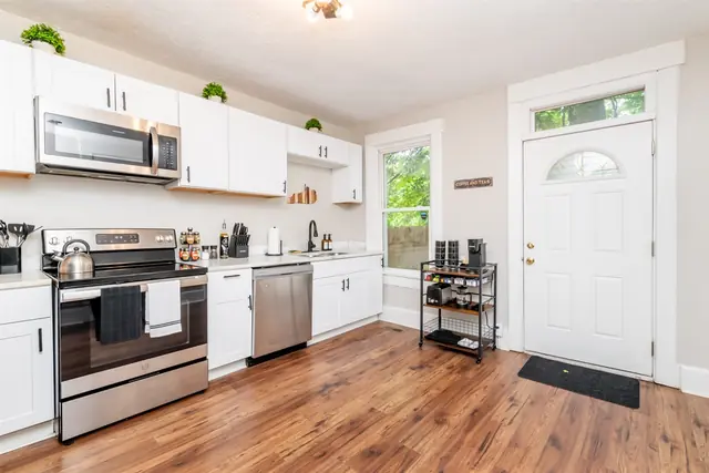 Louisville Charm | 3BR | Private Yard: Kitchen with stainless appliances