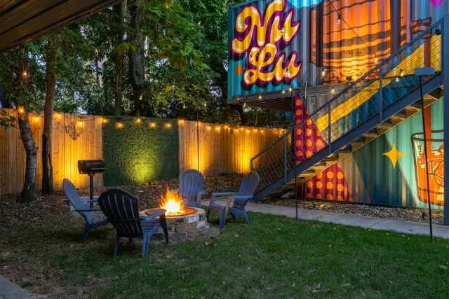 4-Unit Group Stay in NuLu | Shipping Containers 1-4: Backyard fire pit at night