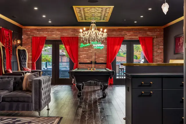 Untouchable Retreat: Great room with pool table and lounge
