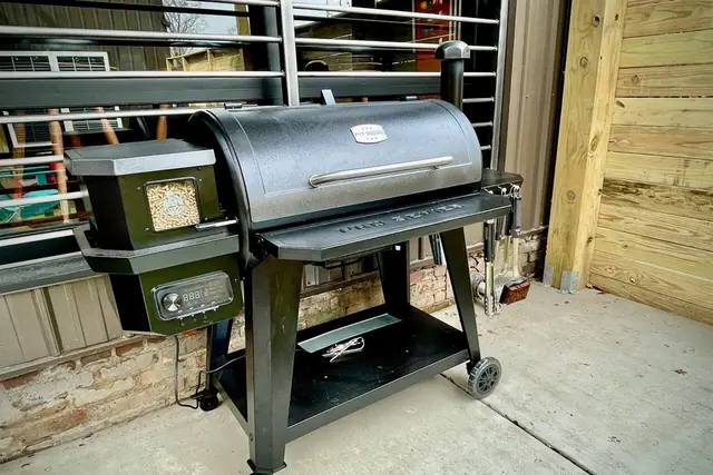 The Ultimate Louisville Event Estate | 12BR Double Property: Pellet grill on the patio