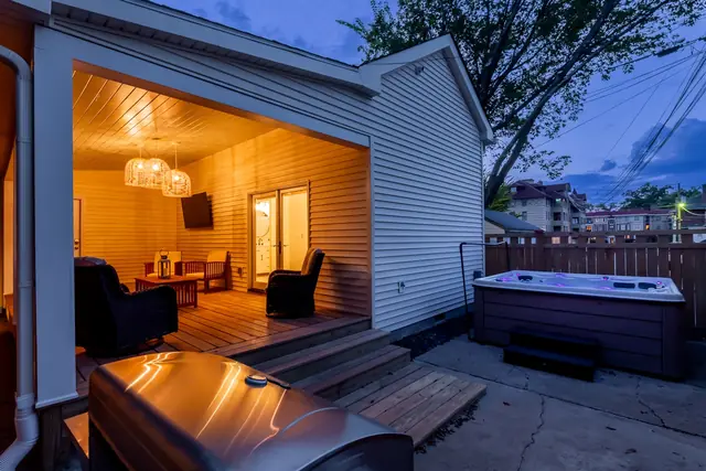 Highland Elegance: Highland Vacation Rentals: Covered patio with hot tub