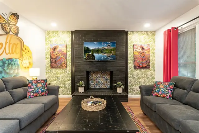 +51: Living room fireplace and TV