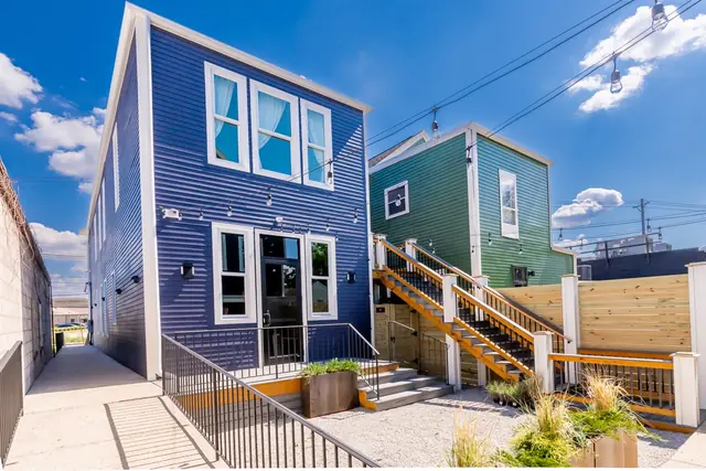 Single Malt: Blue building with back deck and stairs