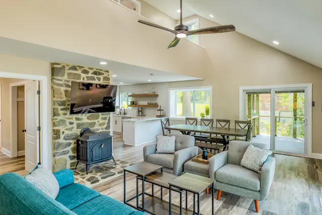 River Refresh: Living room, side facing, bedroom door open