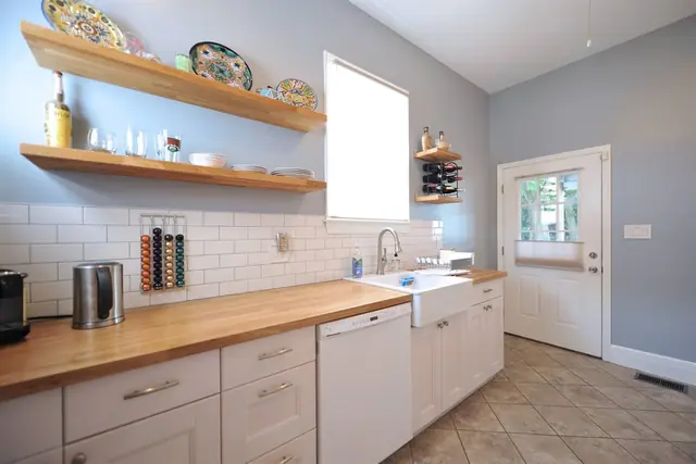 Garden Retreat: Kitchen with open shelving and butcher-block counters
