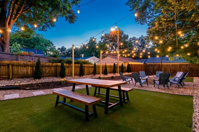 Bonnycastle Blue: Backyard dining area with string lights