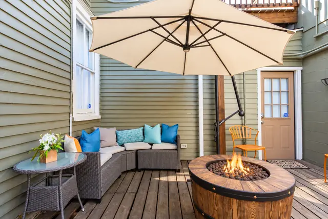 The Paddock Guesthouse | 9BR Highlands Home on Restaurant Row, Louisville: Patio with fire pit and sectional