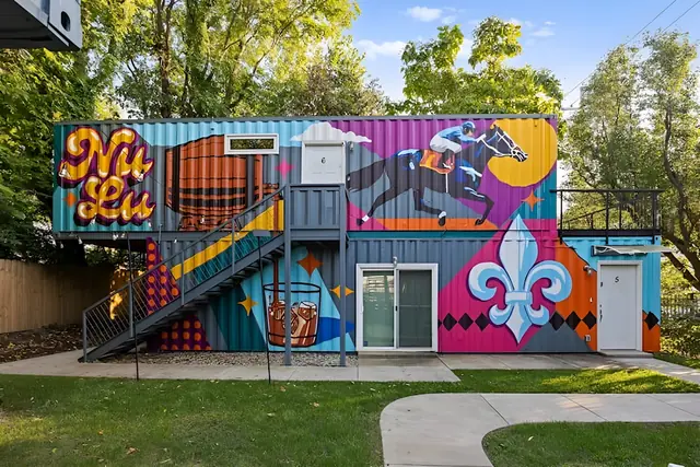 Modern Shipping Container Stay in NuLu | Unit 1: Container building with NuLu mural