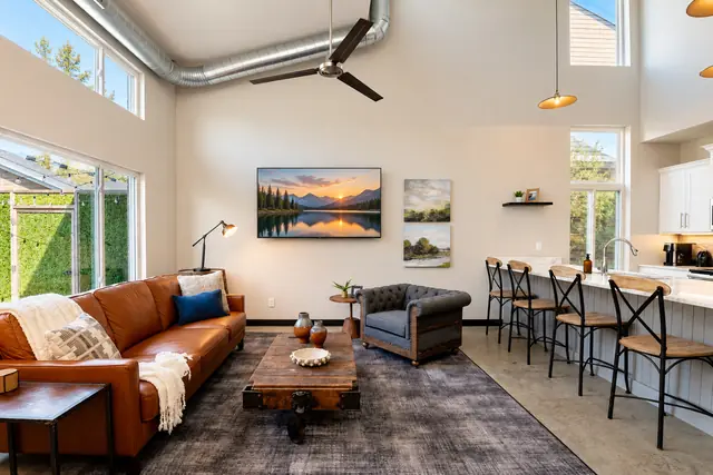 Lyndon Loft Oasis | 2BR Townhome with Private Garage: Living room with leather sofa