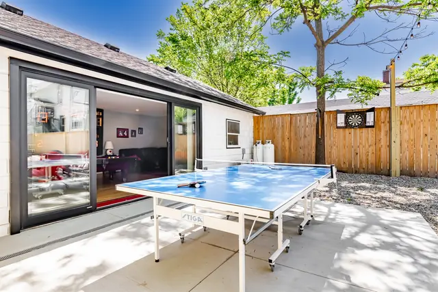 Courtside: Patio ping pong table and sliding doors