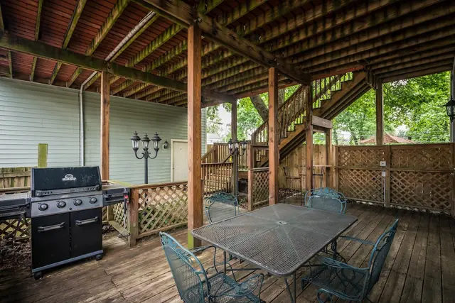 Highlands Hangout | 6BR Highlands Home near Restaurant Row: Lower patio with dining table and grill