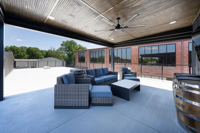 Kentucky Stables and Saloon | 6BR Louisville Retreat: Rooftop terrace with sectional