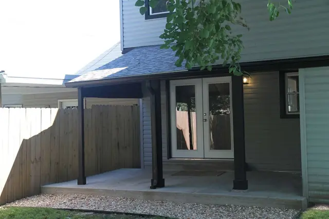 Germantown Luxury Retreat: Covered back patio with French doors