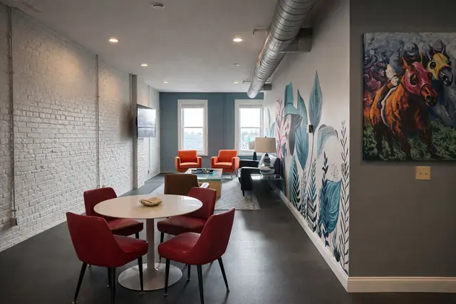 The Lily: Dining table and living area