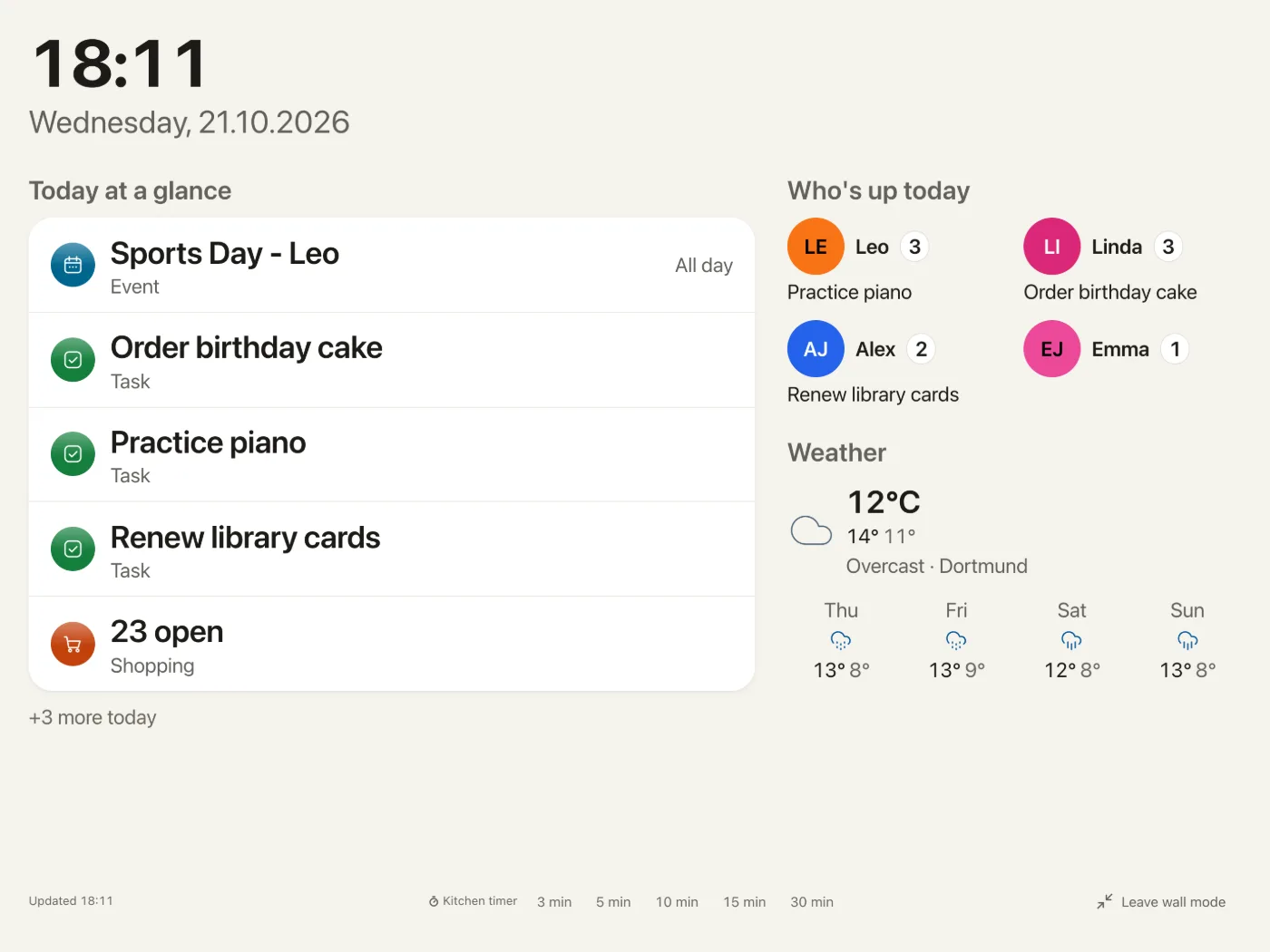 Yuvomi wall mode on a landscape tablet, with the footer at the bottom: Updated, kitchen timer, Leave wall mode