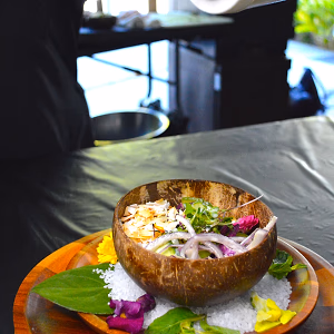 Cucumber and Coconut Salad served in a halved coconut