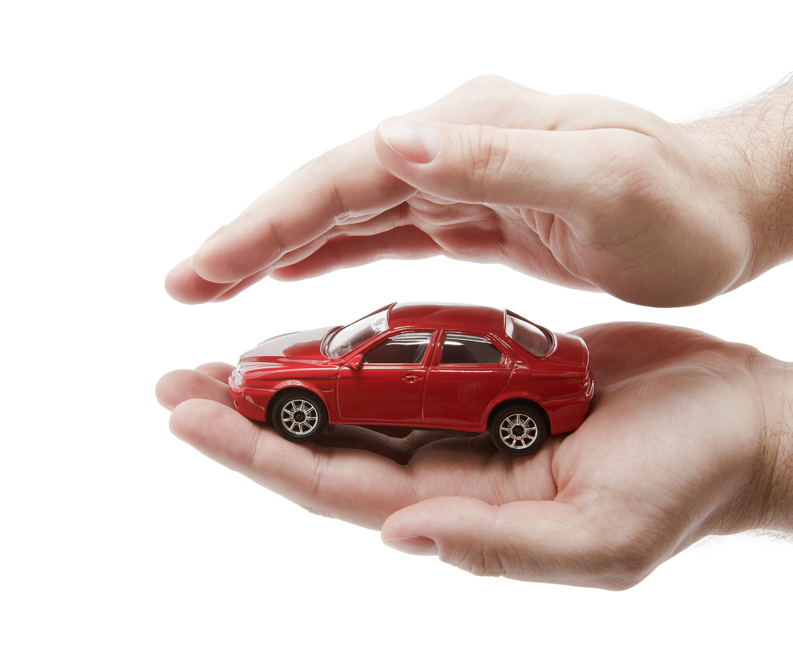 hand protecting toy car