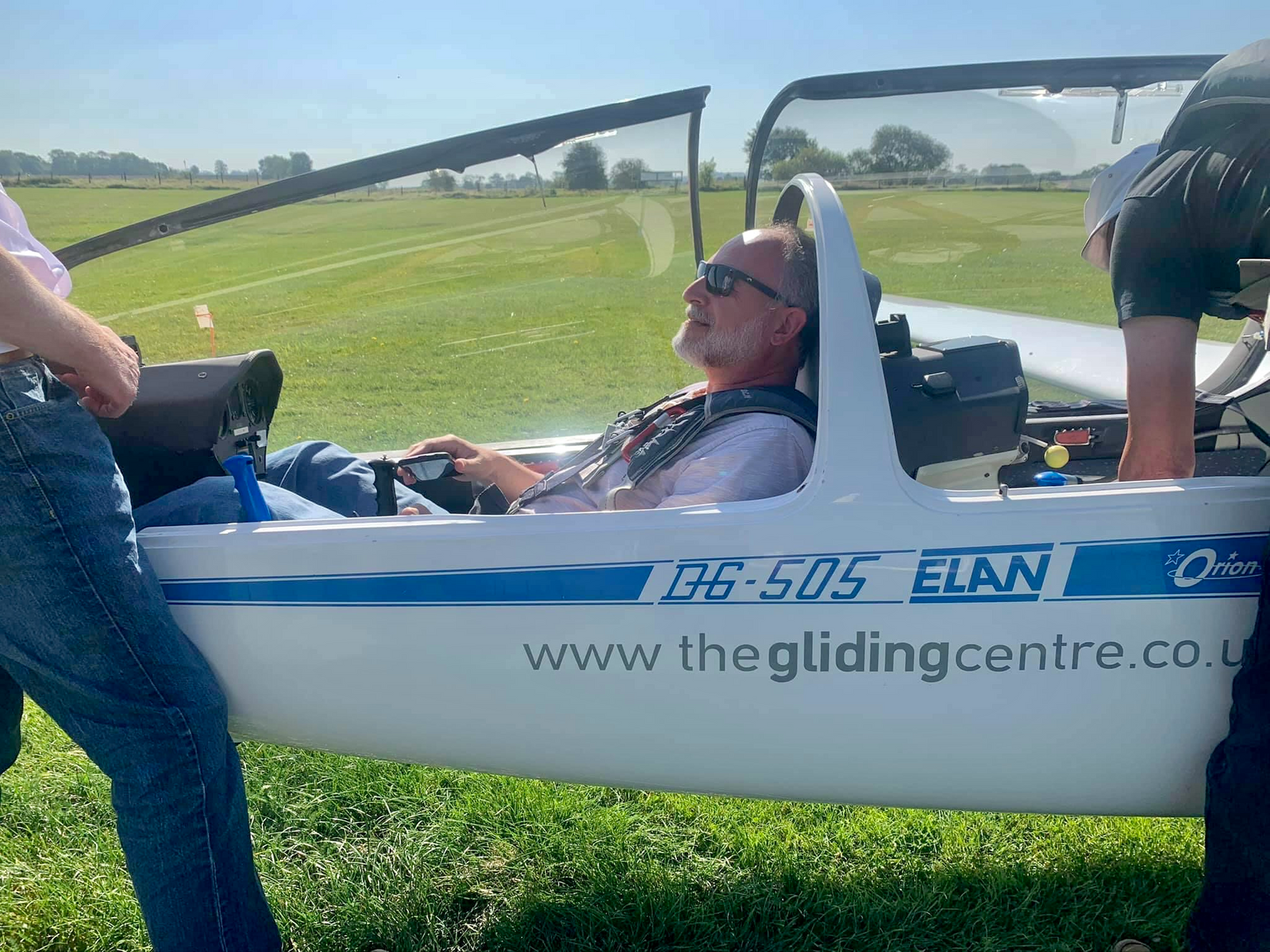 (Getting ready to go up in a glider, with my parachute on.)