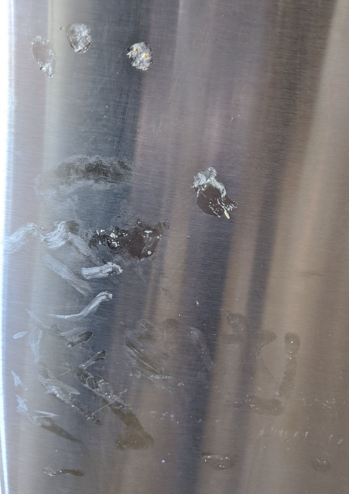 Once we knew the fridge was a goner, I didn't even try to prevent Little L from making her mark.