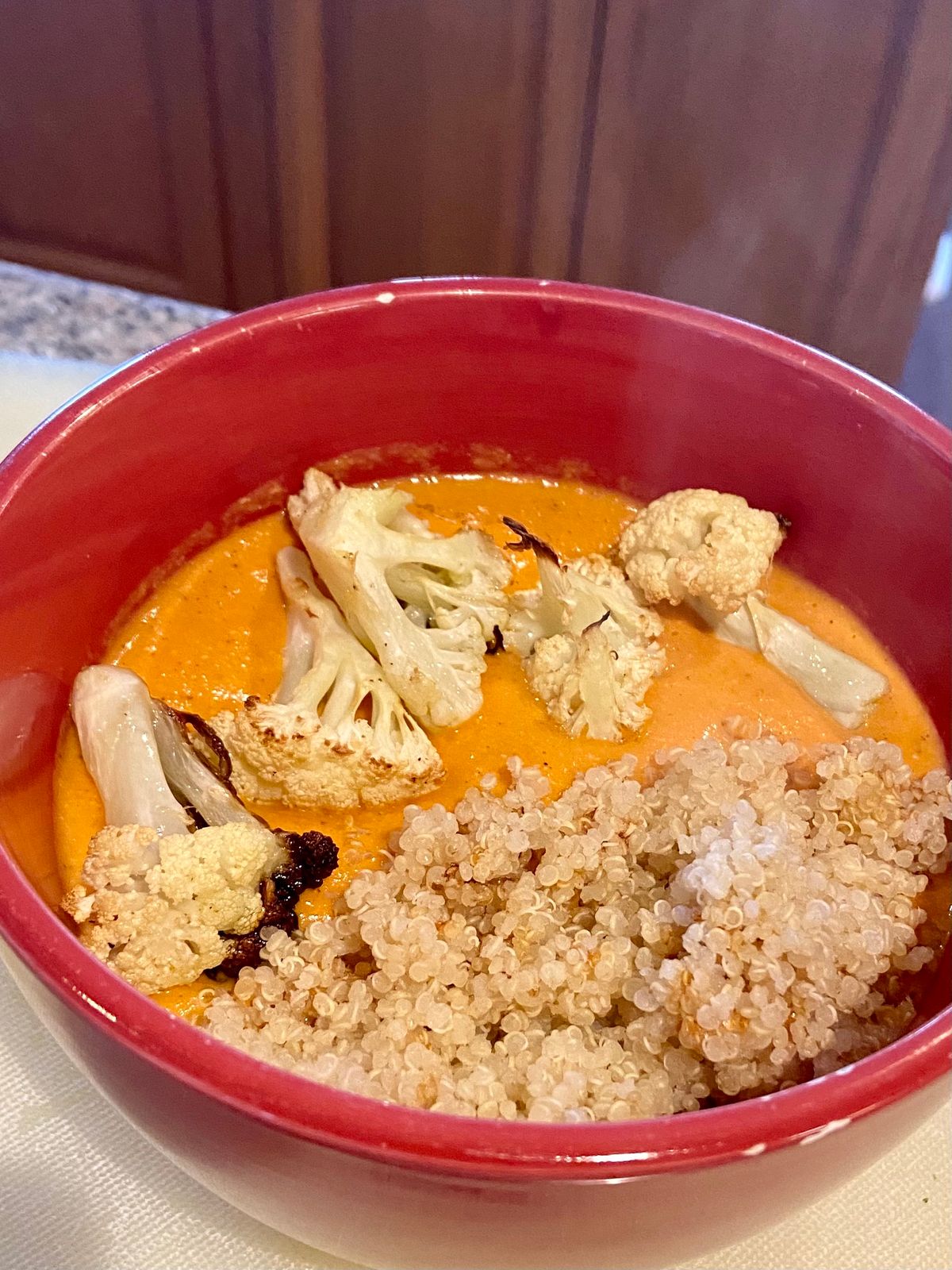 Recipe:
For 4
1/2 cup quinoa
About 1 1/2 cups cauliflower florets
8 small garlic cloves or 4 large
2 shallots
1/2 cup cashews
Two 14.5 cans roasted tomatoes
2 cans of 5.5 ounces coconut milk.