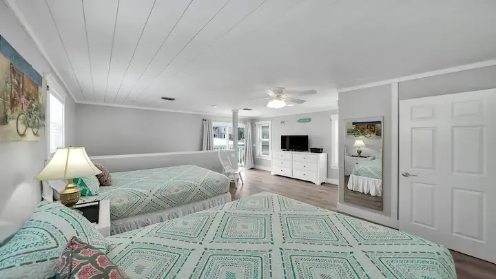 
About this space

Ocean Street Hideaway is a beautifully finished Florida Cottage style beach house with a private pool. It is located on the east end of Panama City Beach on Surf Drive just down the street from the popular Longboards Restaurant and Bar. Moving in with your beach gear is a breeze with ample parking available just outside the front door for up to 6 full size SUVs. Located just 60 steps from beach access, there are no stairs on the main level and there is no busy street to cross. The property boasts HDTVs with Rokus throughout the home, live channels via YouTube TV, as well as high speed wifi that is perfect for streaming. 

Great Location; perfect for a group! This 5 bedroom + Loft Room has 4 Baths and a Private Pool and spa. Sleeping arrangements are first-come, first serve! Early birders will have first pick on their beds.

Everyone will have enough space to spread out. There are no steps on the main level and a beach view from the upstairs balcony. 

Recent upgrades have been made, including living room furniture and all new bed linens. Property is Pet Friendly with pet fee. There is a non refundable pet fee of $150 per pet, up to two pets. Pet owners must clean up after pets. Pets are not allowed on furniture or in the pool under any circumstances. Some restrictions may apply. 

All bed linens and interior towels are included. Please bring your own beach and pool towels. Full size washer and dryer are available in the laundry room.