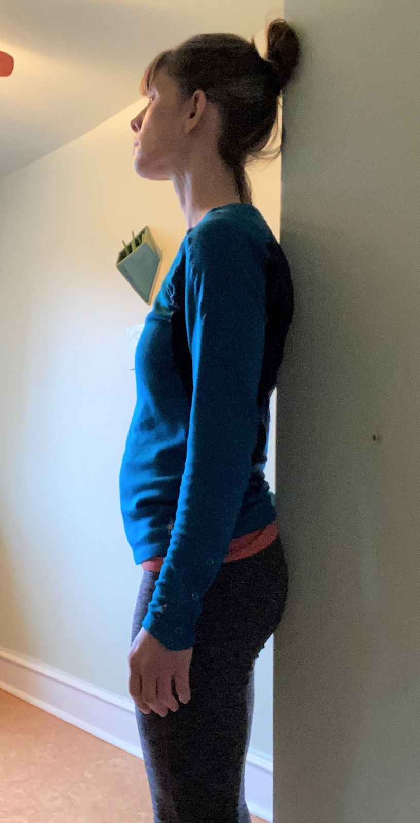 Here my chin is lifting and the back of my head is not against the wall.