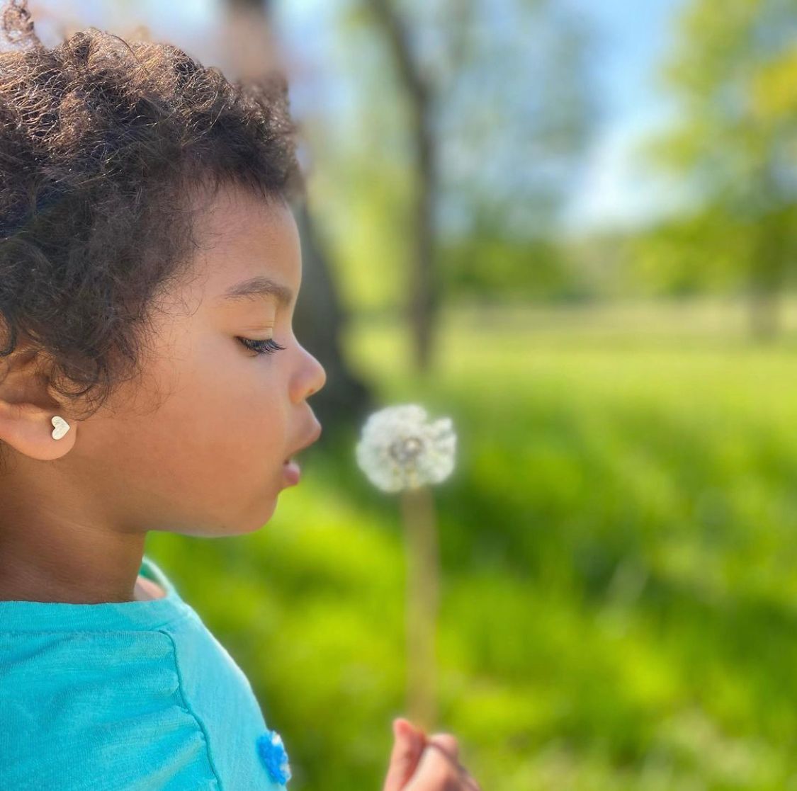 Photo By @kidsherbalism, Stewarding the earth through wishes and dandelion seeds