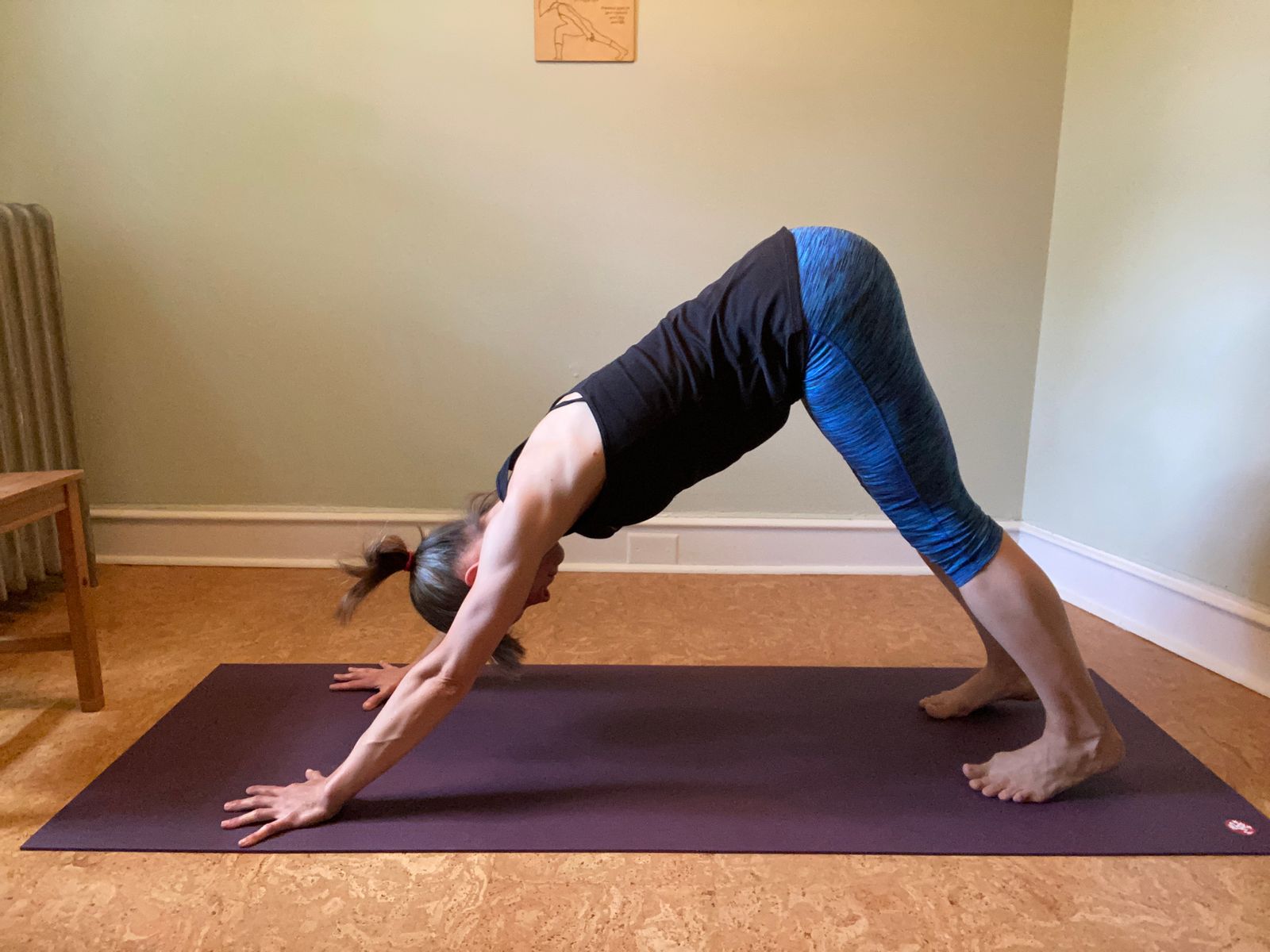 lifting your sitting bones and pressing your heels down creates length along the back fascial line, as does lenthening tailbone and crown of head away from each other