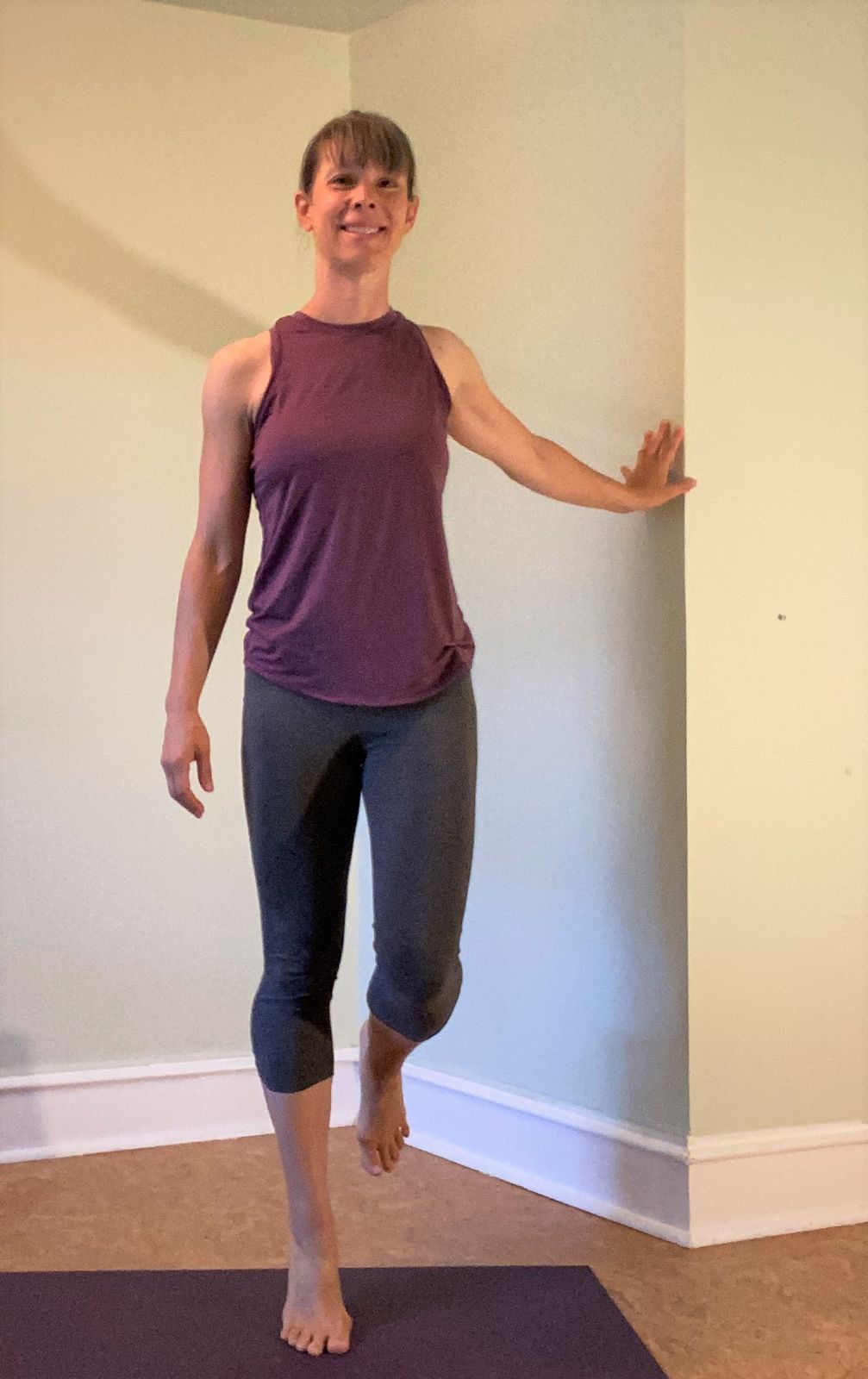 Next, try the same exercise on one foot. Because we want to work on endurance here (and it's so challenging), hold onto something to assist with your balance!