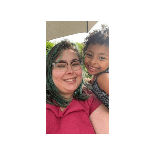 Catherine is a kind, creative, kick-ass mom & all around super-cool person.
Catherine joined the Anti-Diet Workout Club when it very first started. They’ve been at every one since. In their words “Billie’s Anti-Diet Workout Club is so much better than I expected it to be”. They were hooked.
They come to as many live classes as their busy mom-ing life allows.They participate in the social time, exploring the ways that diet-culture may have effected movement in the past.
In the workout club they found a safe space, where they could learn to listen to their body, and connect with themselves again.
They could connect to a community of like-minded folx.
They actually found themselves looking forward to the workout club each week.
They began making small ripples of diet-culture rebellion,
in turn making some big waves in their life.