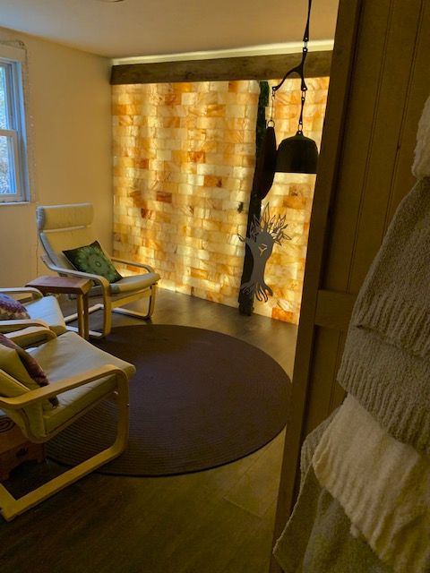 This is the salt room staged for a group and for members you get your massage in this space and it is super special!