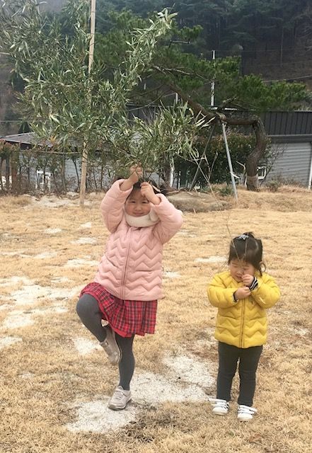 My nieces show me their Tree poses