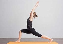 Warrior Pose is a standing posture contained in Sun Salutations that target the legs, glutes, and core.
