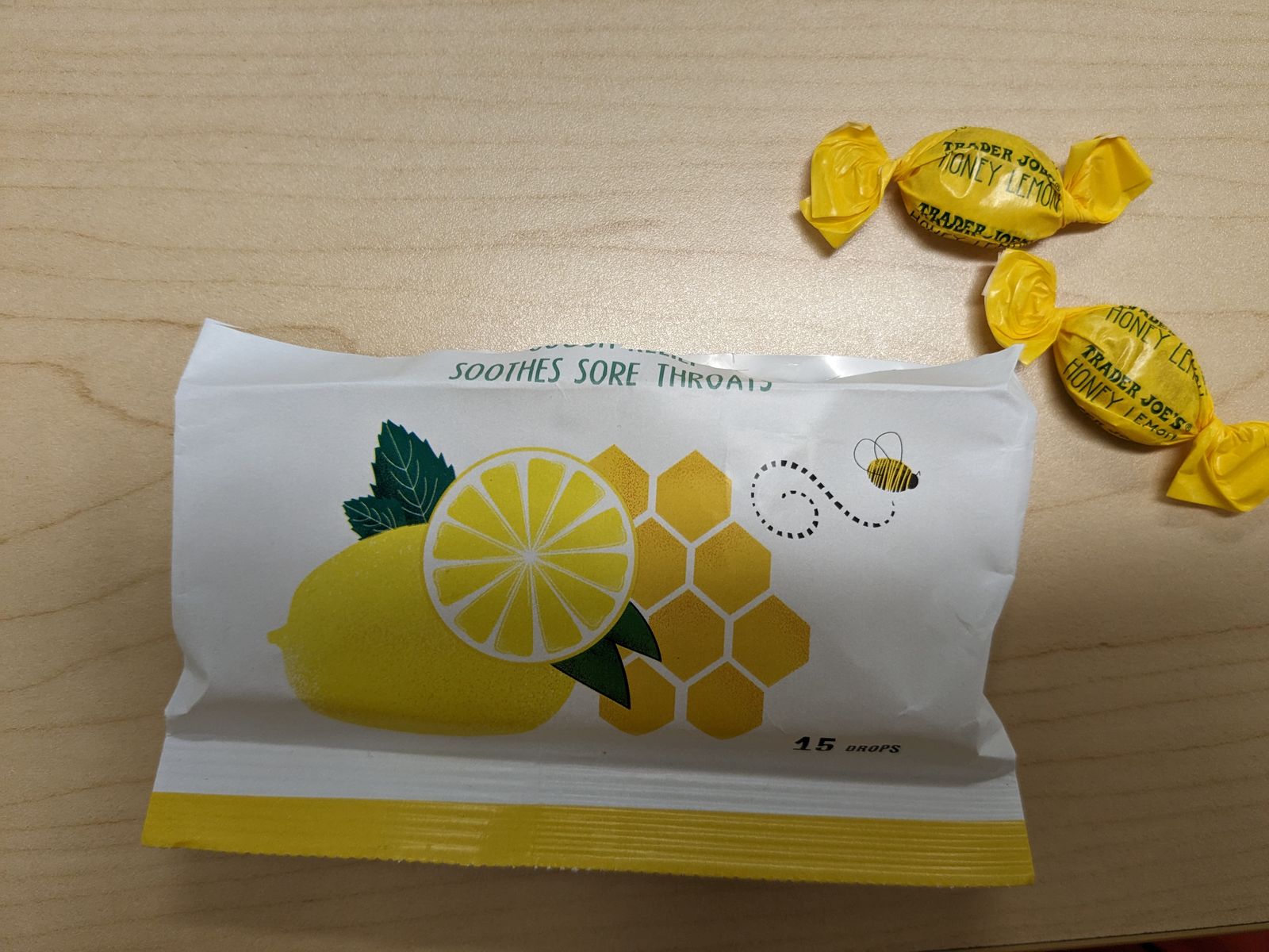 Do you notice how she trimmed the bag since it was almost empty? I've seen others do this - super handy for a bag of chips that's almost low, for example. Cough drops and a great tip, all in one!