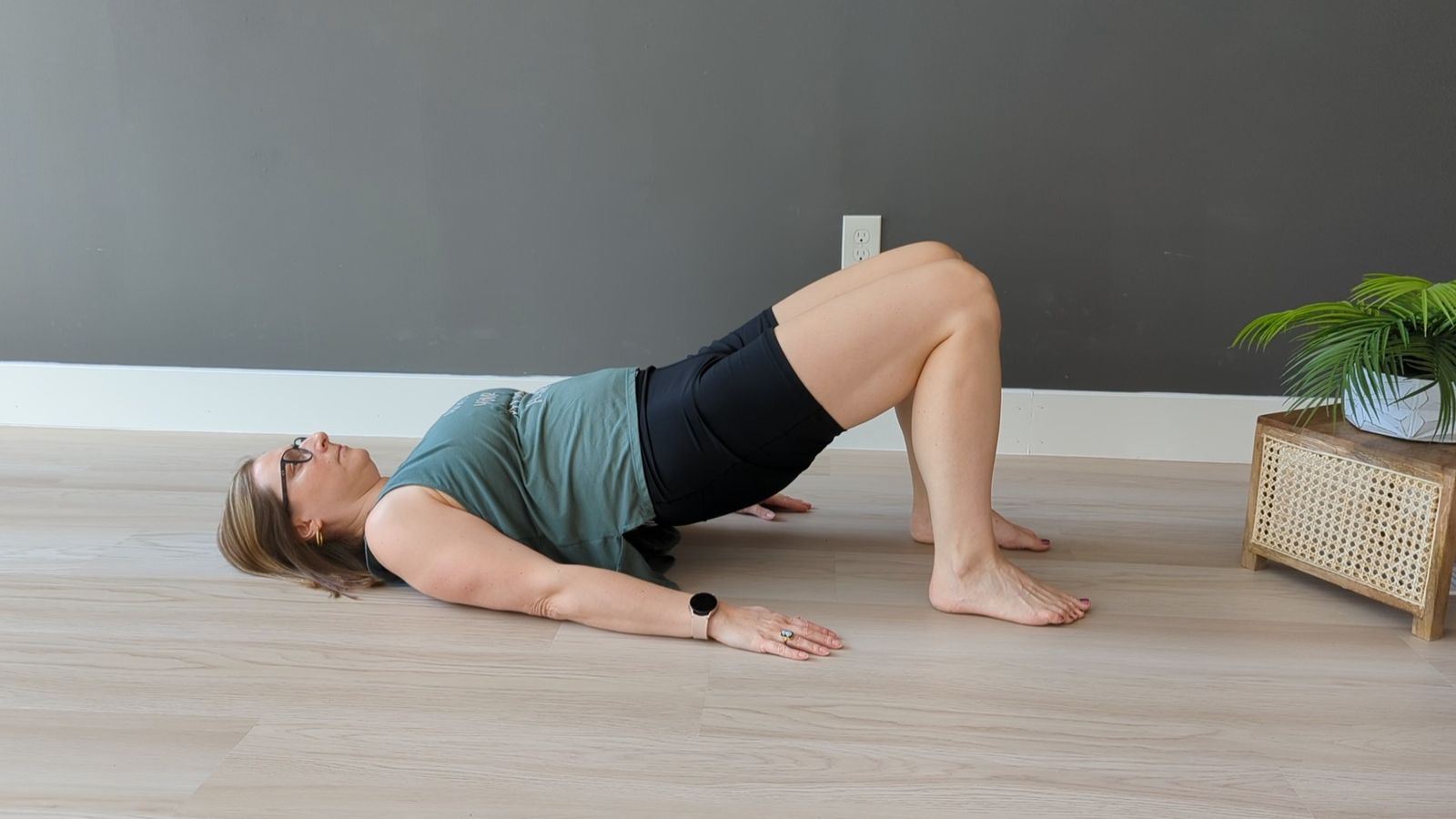 Do 10 bridges lying on your back with knees bent moving the hips up and down slowly. 