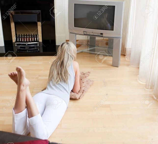 A version of sphinx pose watching TV