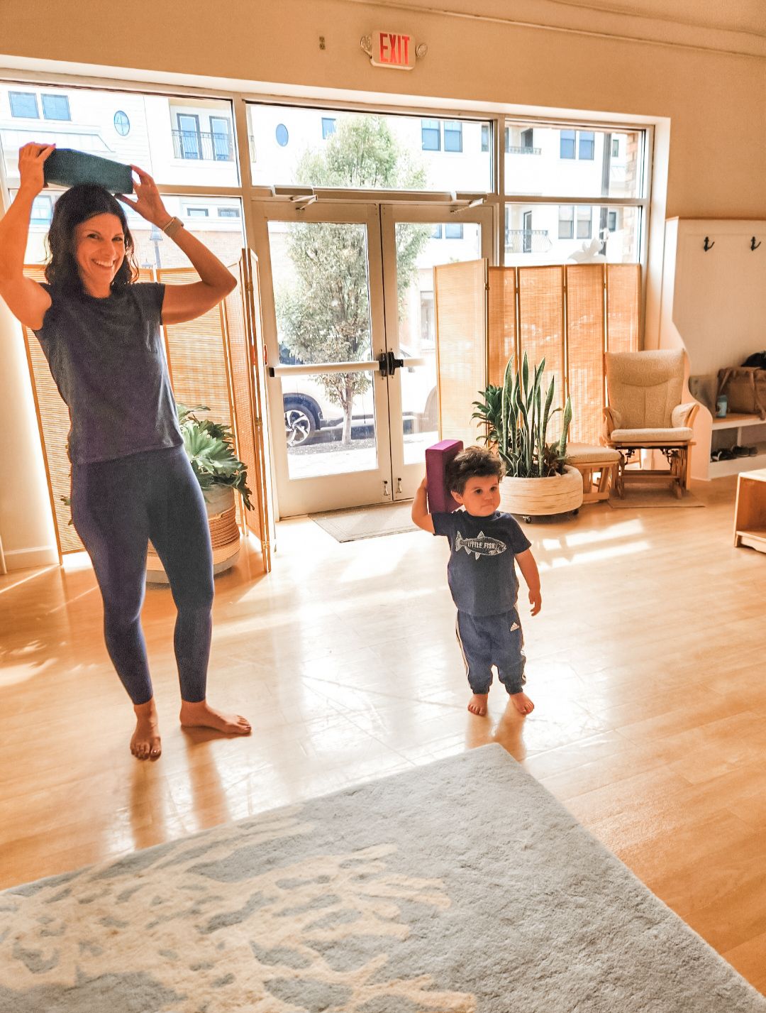 Christine showing Declan how to balance with blocks