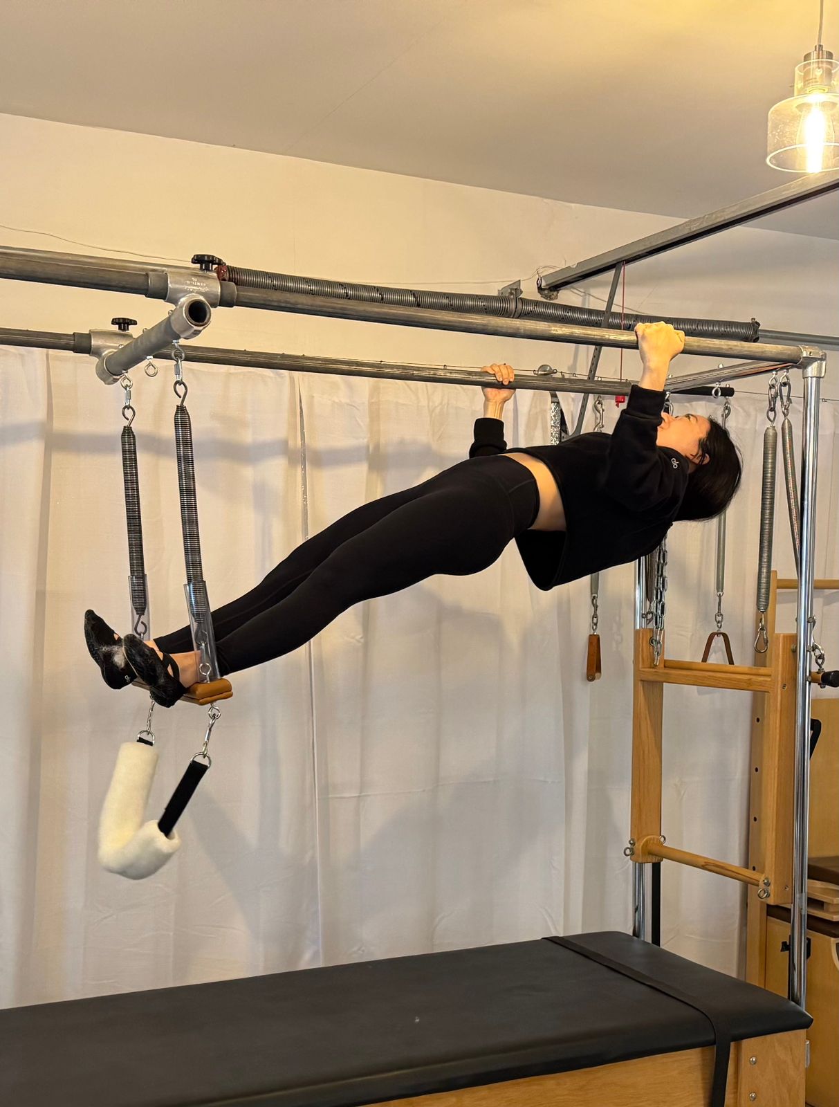 Kelly doing Hanging Pull-Ups on the Cadillac. This could be you!