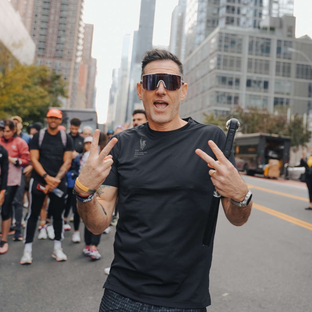 man with sunglasses in black shirt in new york city