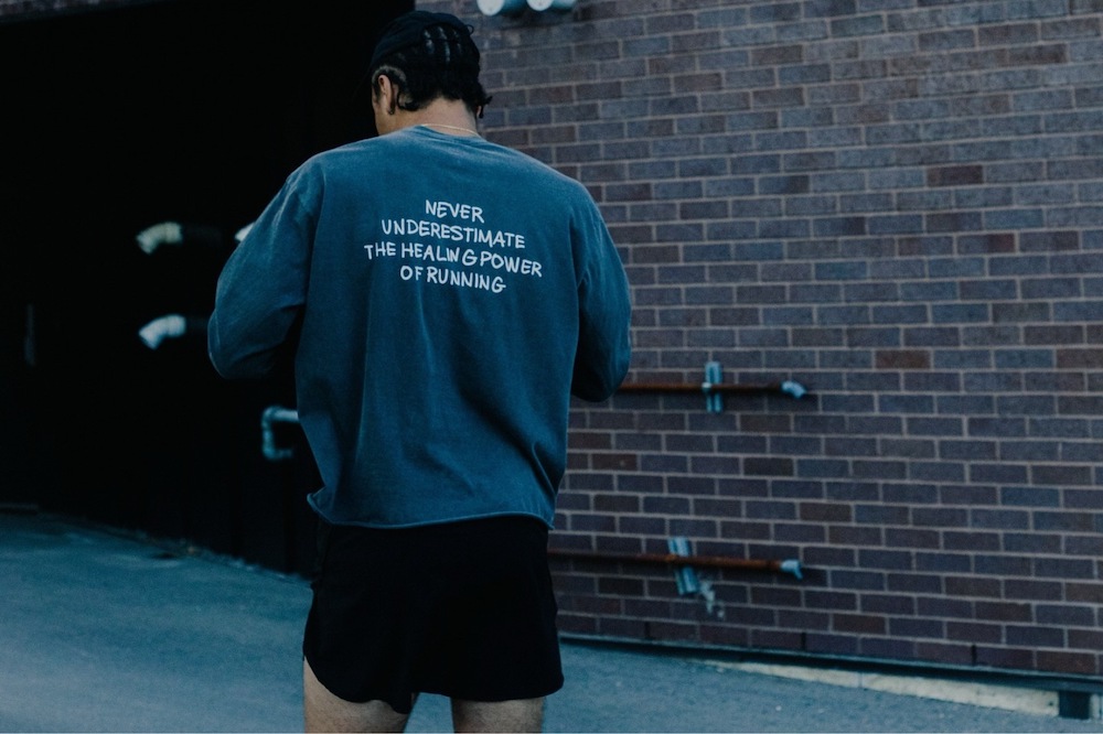 man with back turned