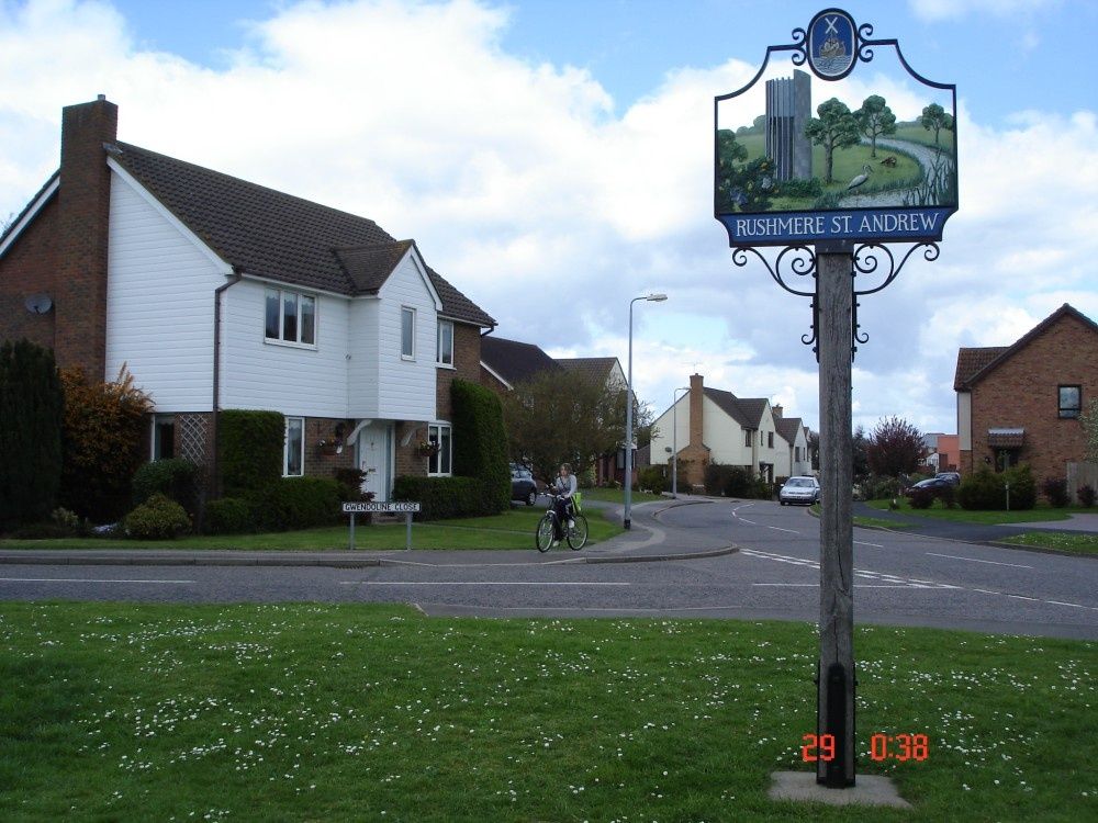 a person riding a bike along the street