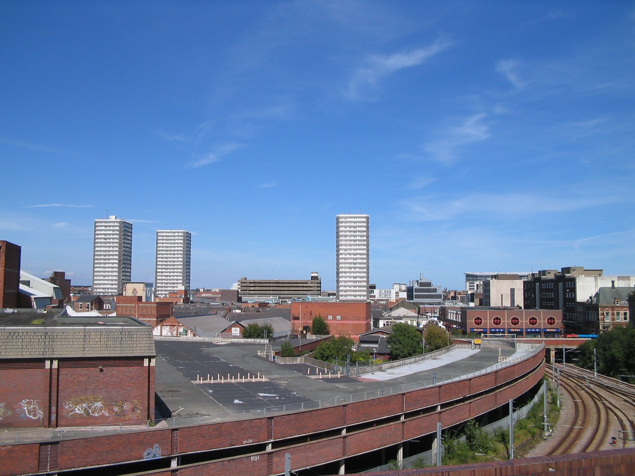 A skyline of a city with many red brick buildings