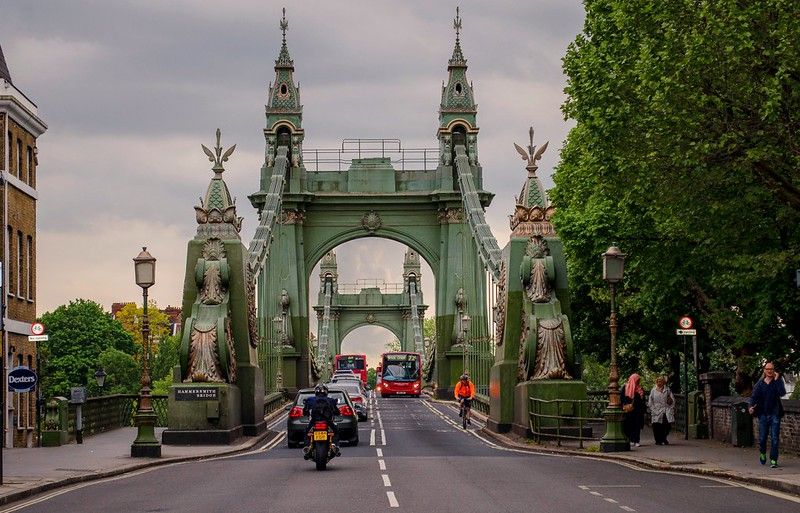 A bridge with cars and bikes passing through.jpg