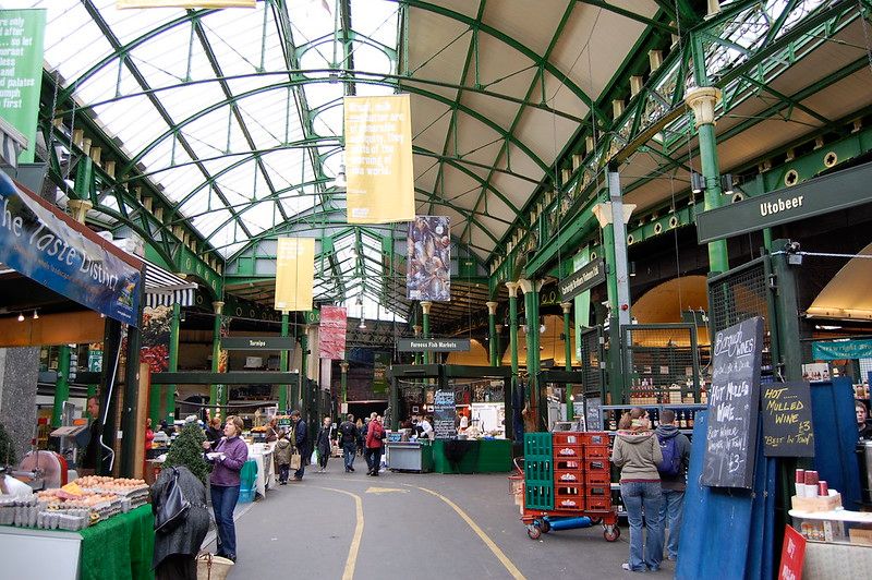 A busy market with plenty of shoppers and stalls.jpg