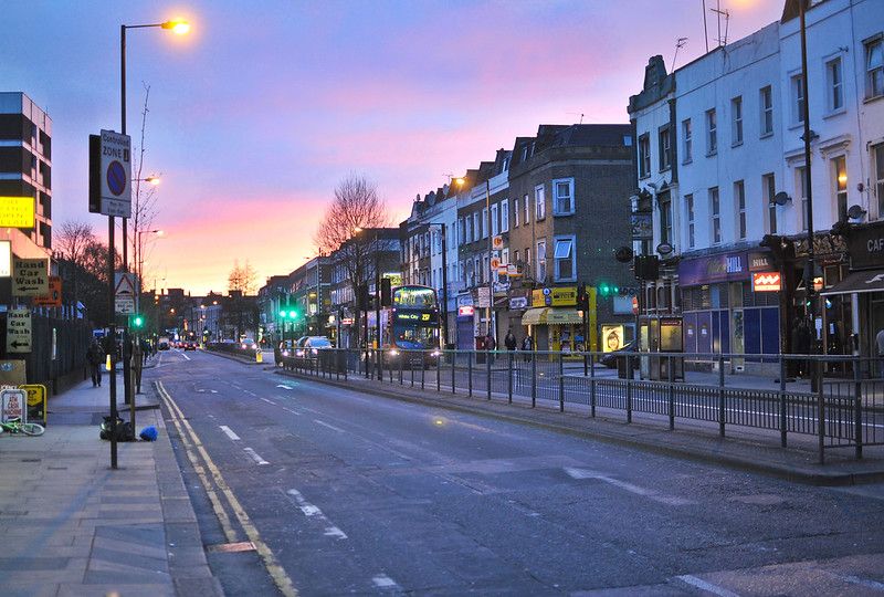 A street at dawn under the light from street lamps.jpg