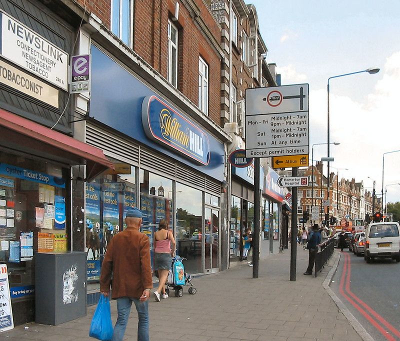 A pavement beside a busy street.jpg