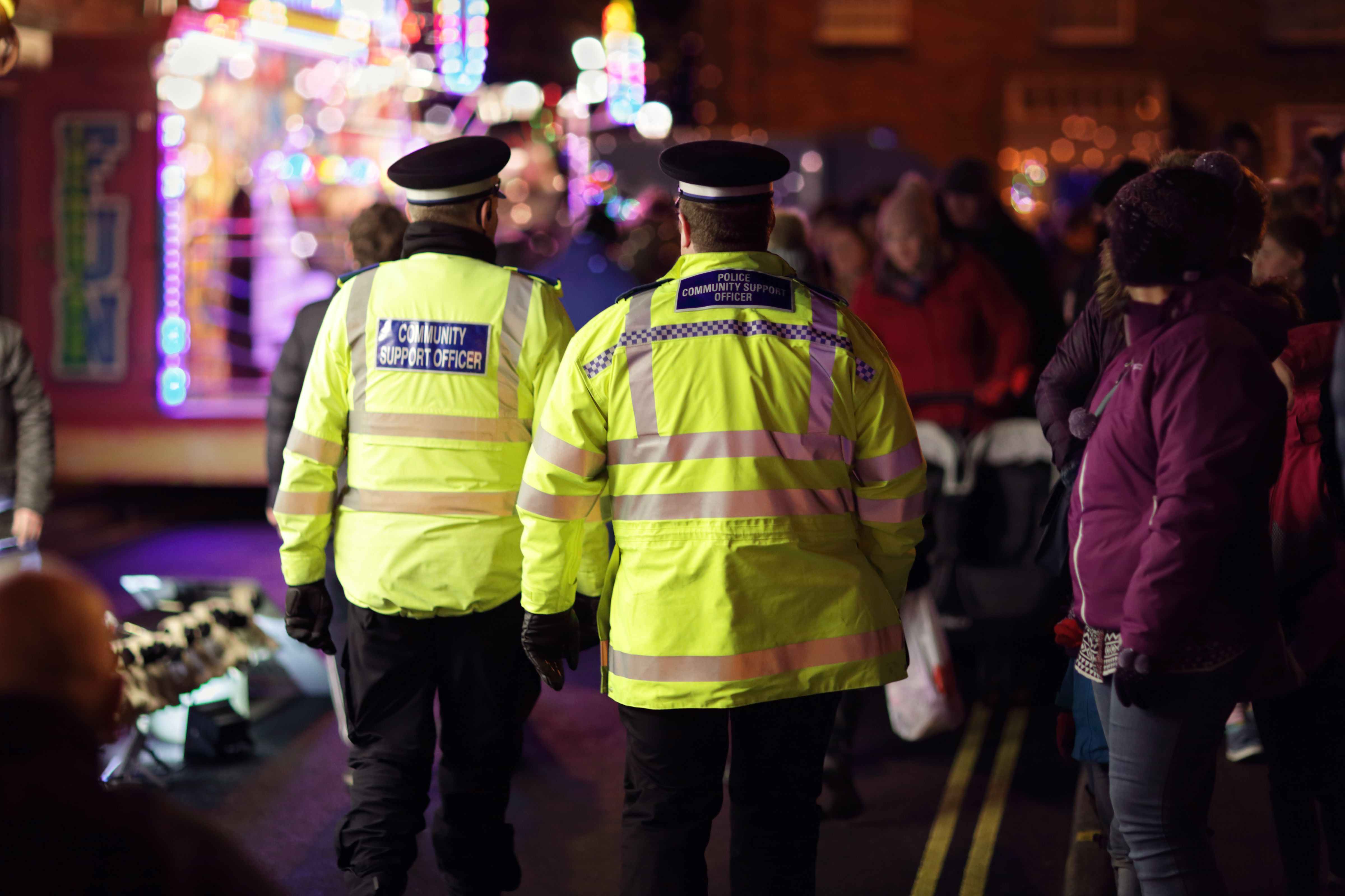 Police in hi-visibility jackets practising crowd control at an event in the UK