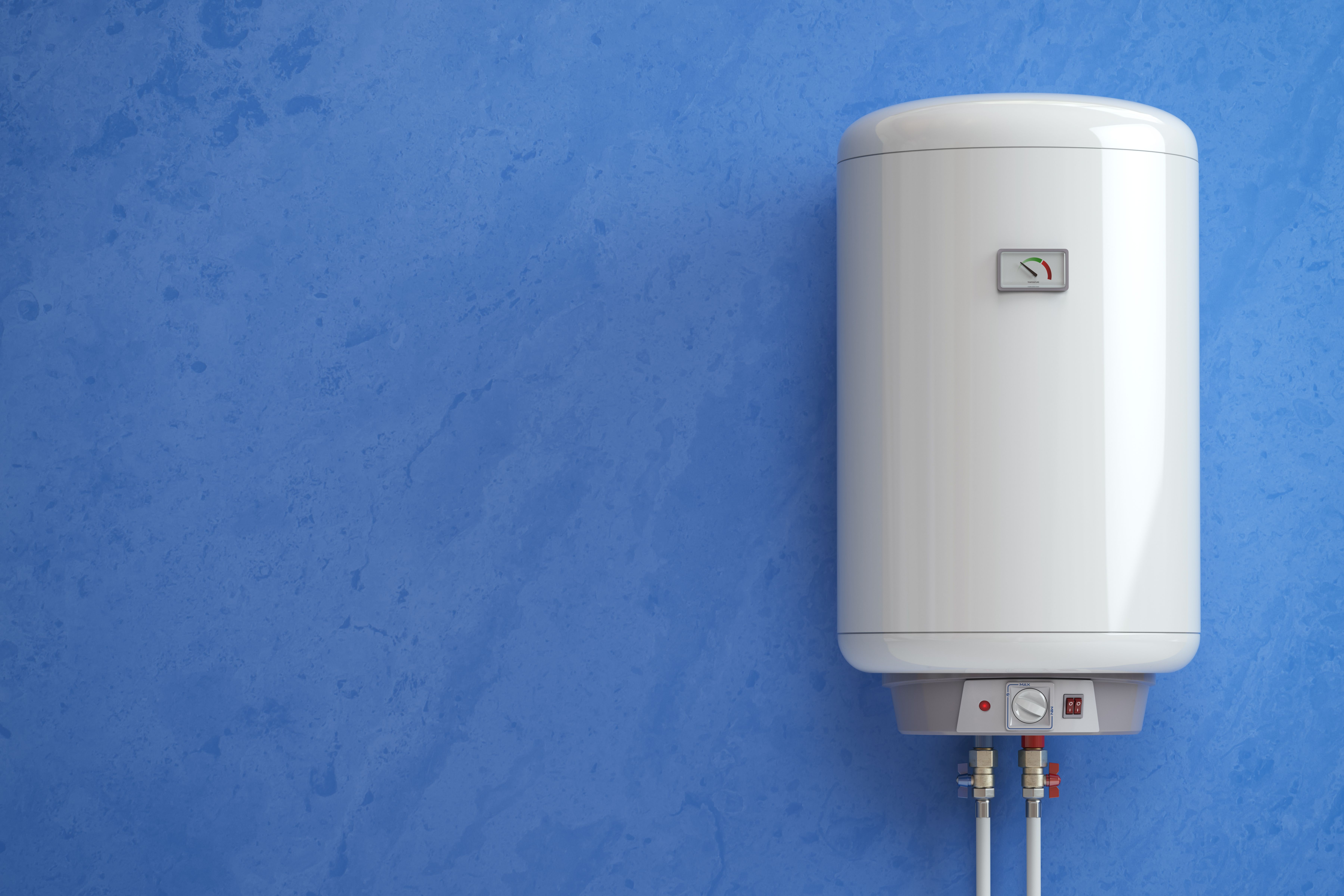 Electric boiler installed on a blue wall