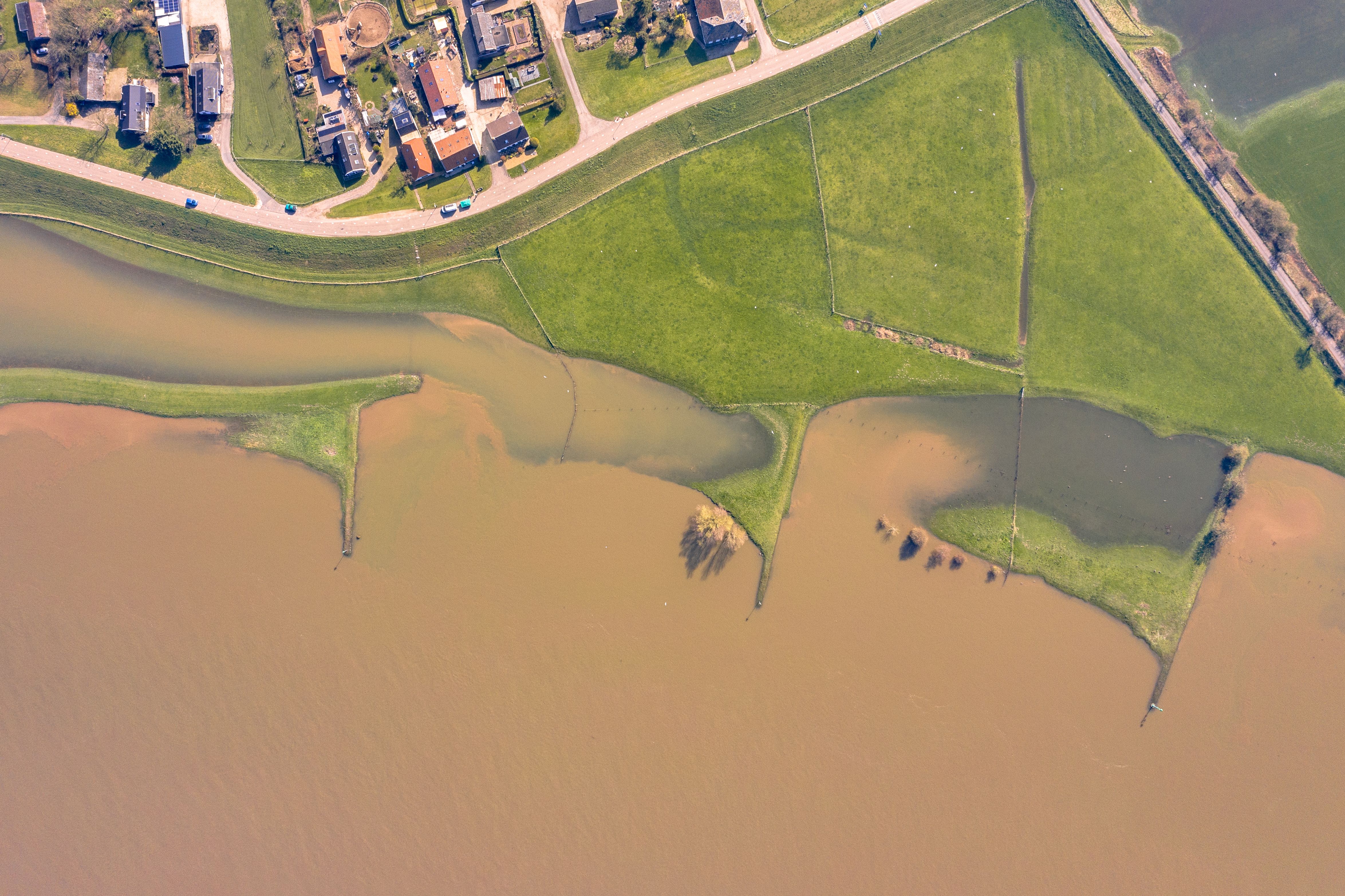 A flooded area with submerged floodplains along a river