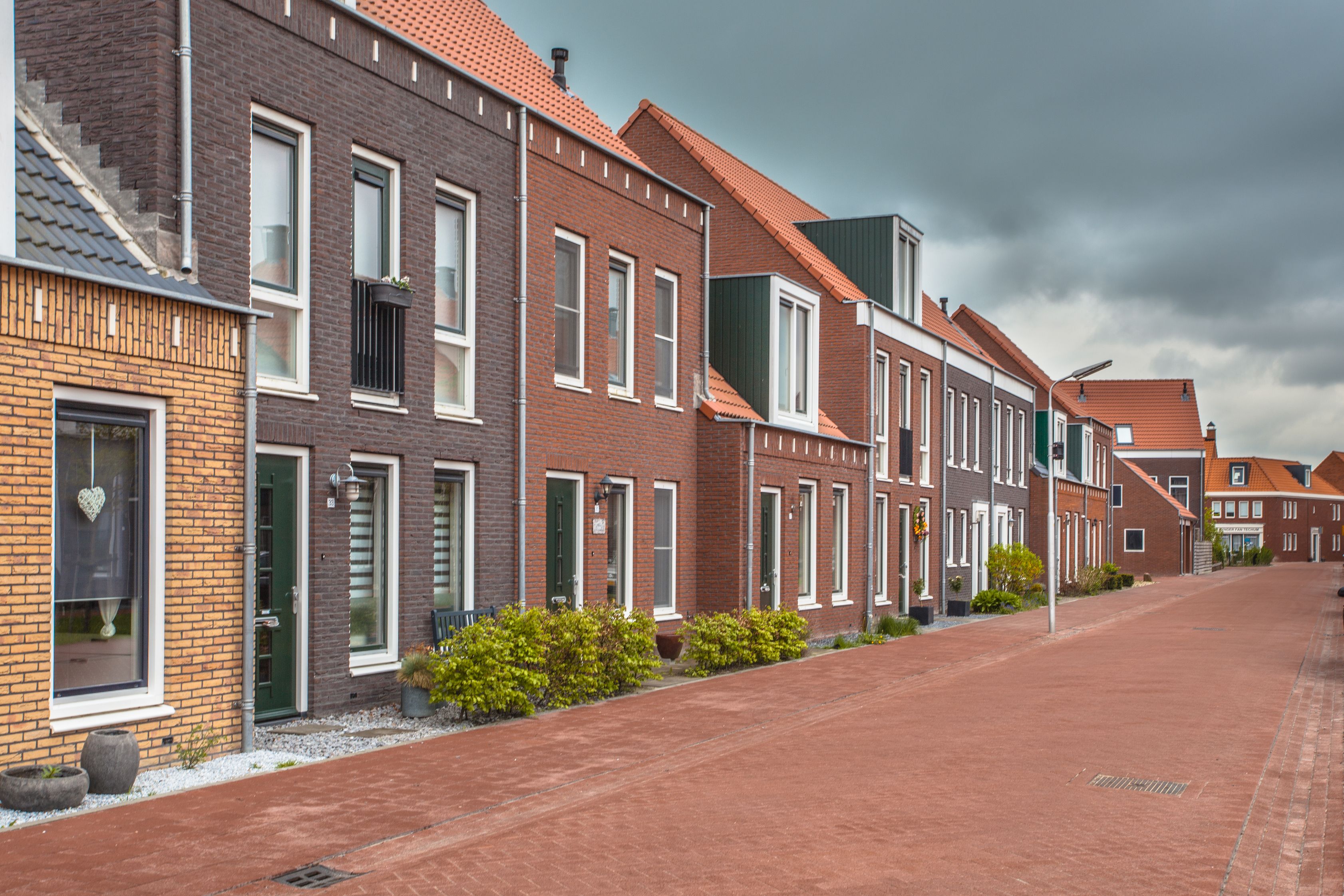 Many houses in a modern village street